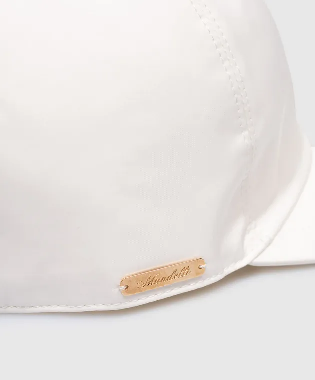 Enrico Mandelli White cap with metal logo