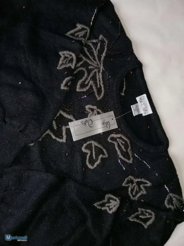 Prendas de punto y sudaderas de varias marcas.