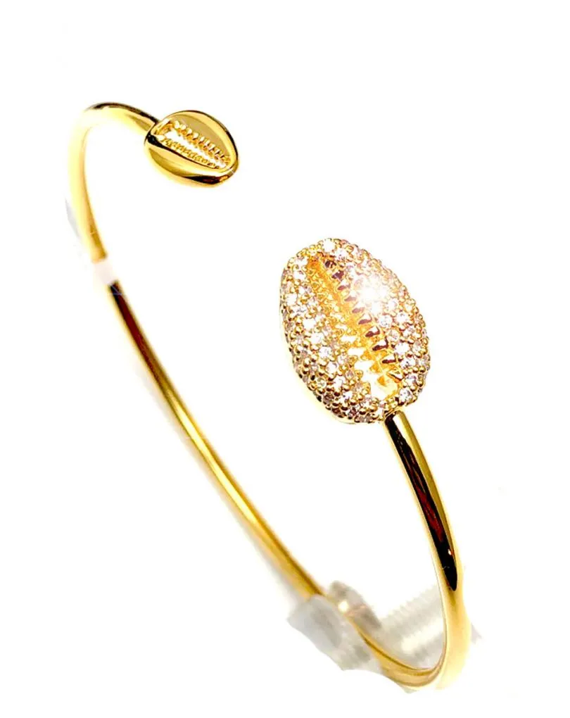 PULSERAS DORADAS FINAS CON VISTOSOS DETALLES MARINOS